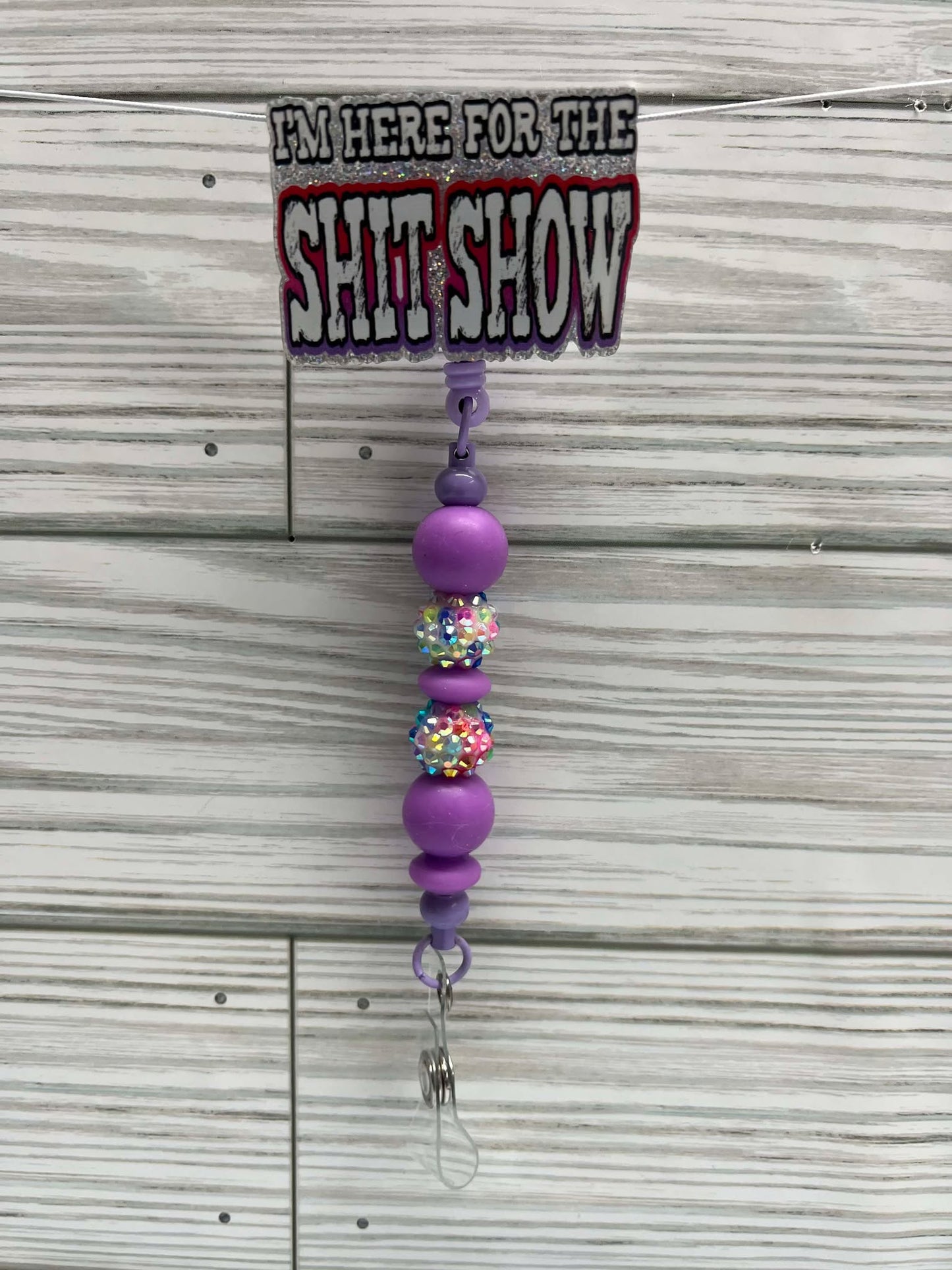 I'm here for the shit show purple - Badge Reel