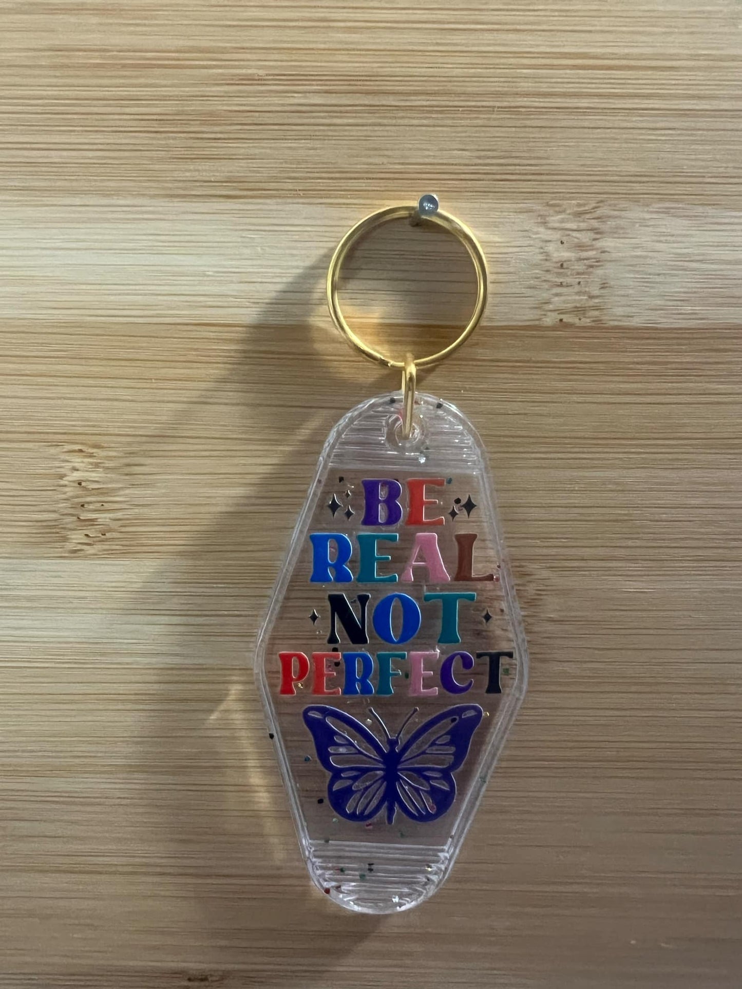 Hotel Be Real Not Perfect butterfly Keychain