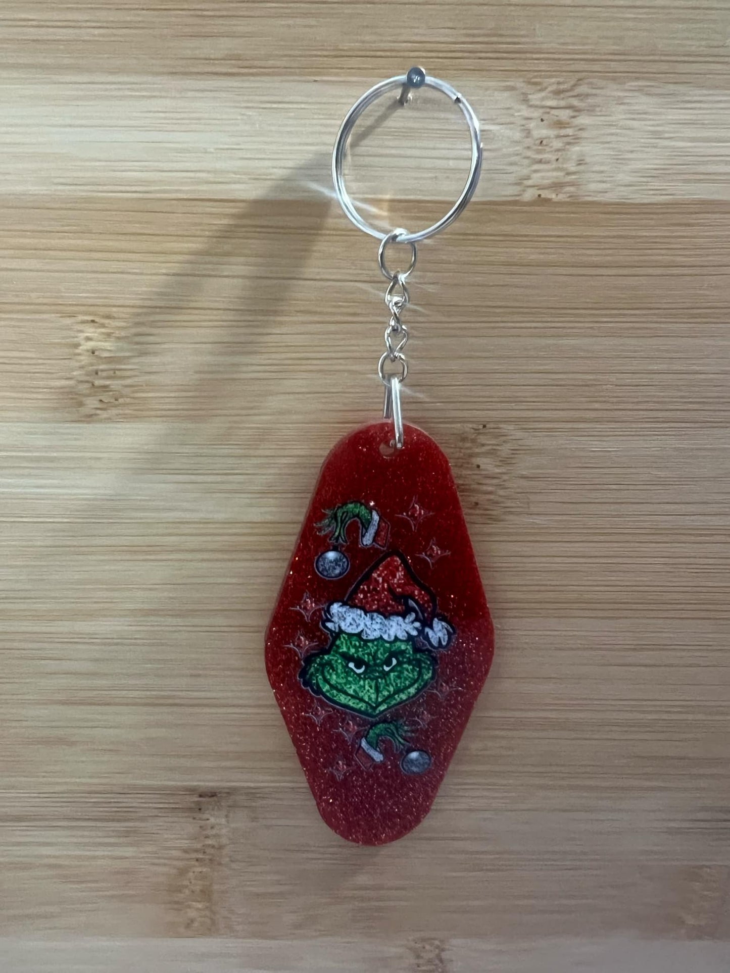 Hotel Keychain Red Christmas Grouchy man